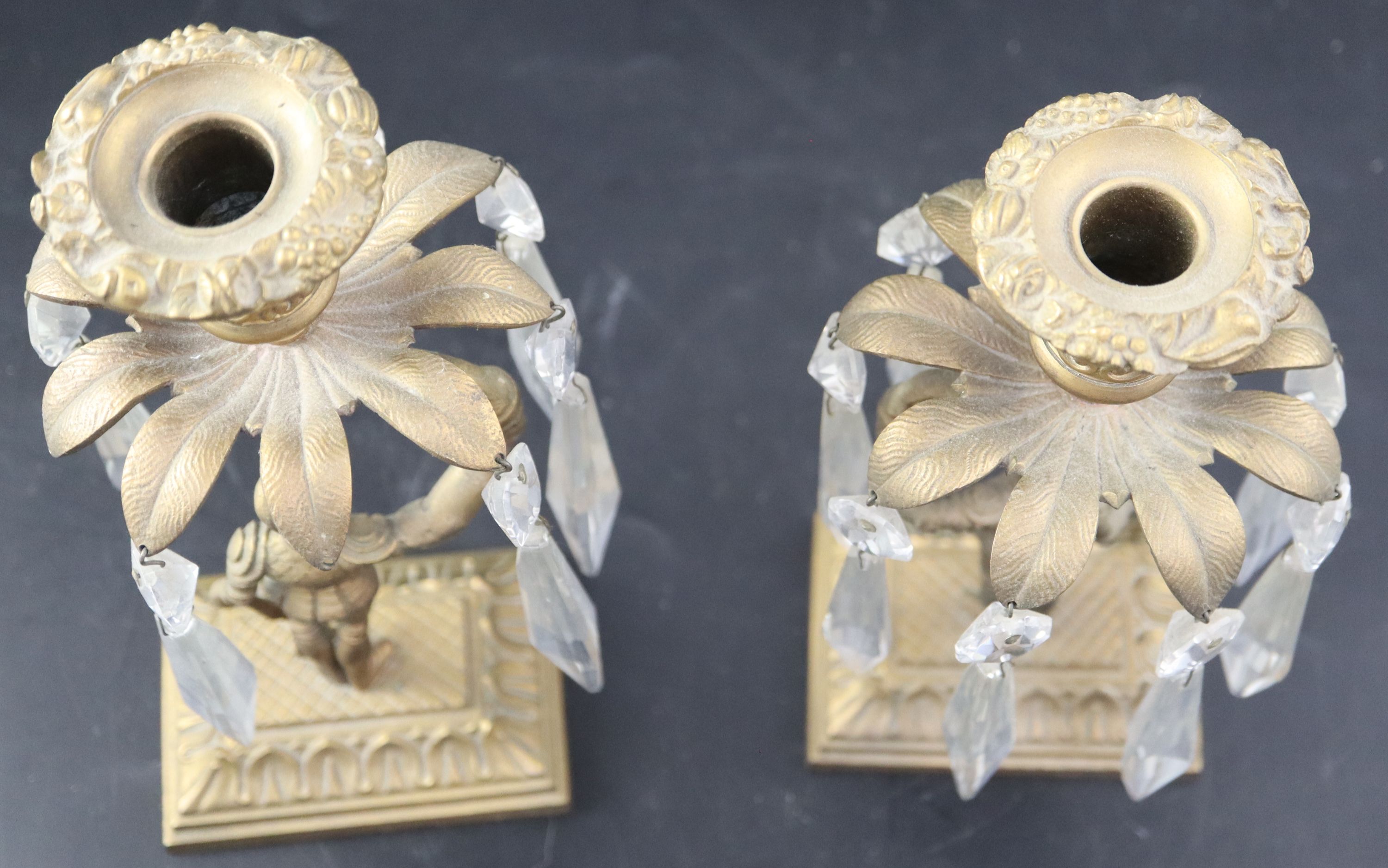 A pair of late Victorian gilt metal candlesticks, height 21cm